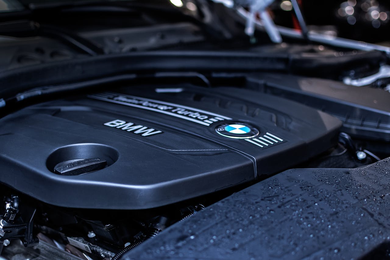 Services Detailed view of a BMW engine highlighting the turbocharger and modern components.